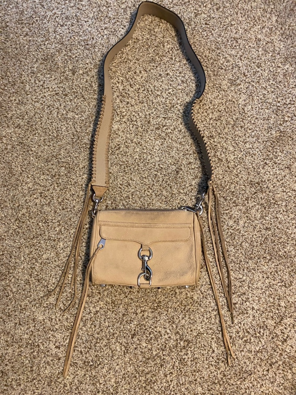 Rebecca Minkoff tan leather crossbody with tassel accents